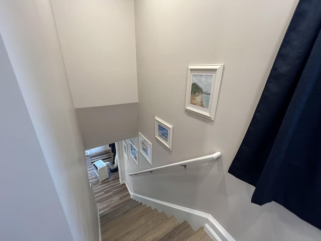 34 Division St, Norwich, CT 06360 - stairs featuring wood finished floors and baseboards