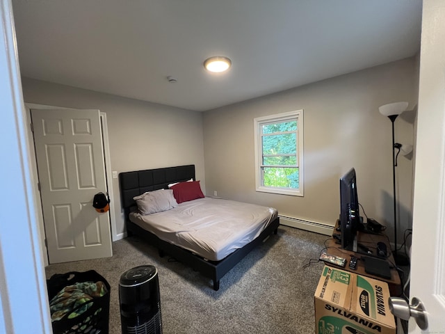 34 Division St, Norwich, CT 06360 - carpeted bedroom with a baseboard heating unit