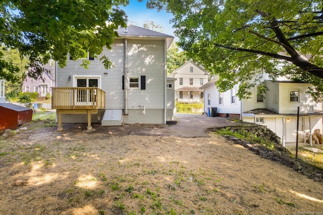 34 Division St, Norwich, CT 06360 - back of house with a wooden deck