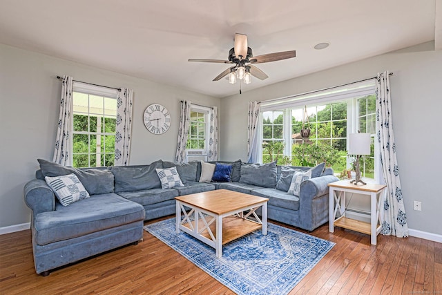 93 Cook Hill Rd, Killingly, CT 06239 - living room with plenty of natural light, wood-type flooring, ceiling fan, and baseboard heating