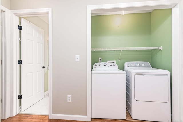 93 Cook Hill Rd, Killingly, CT 06239 - washroom with washer and clothes dryer and wood finished floors