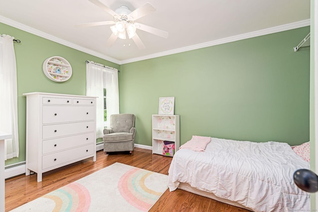 93 Cook Hill Rd, Killingly, CT 06239 - bedroom featuring ornamental molding, baseboard heating, wood finished floors, and ceiling fan