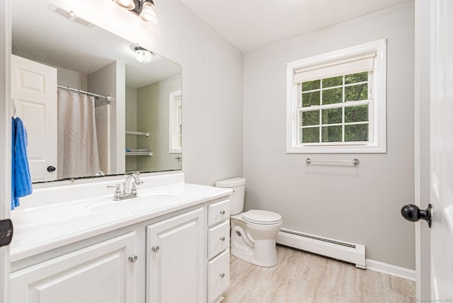 93 Cook Hill Rd, Killingly, CT 06239 - bathroom with baseboard heating, vanity, wood finished floors, and a shower with curtain