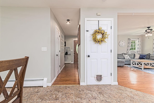 93 Cook Hill Rd, Killingly, CT 06239 - foyer with a baseboard radiator, a baseboard heating unit, and a ceiling fan