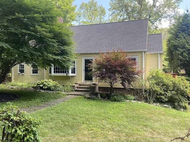 29 Grumman Ave, Wilton, CT 06897 - new england style home with a front lawn, roof with shingles, and entry steps