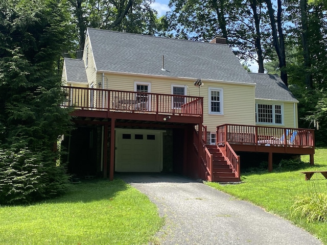 29 Grumman Ave, Wilton, CT 06897 - view of front of property with an attached garage, driveway, a deck, and a chimney