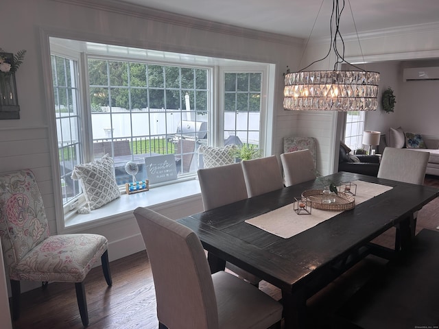 8 Sharon Ln, Old Saybrook, CT 06475 - dining room featuring an AC wall unit, wood finished floors, and crown molding