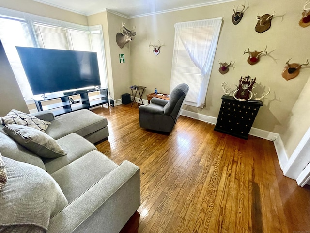 271 S Main St, Torrington, CT 06790 - living room with healthy amount of natural light, wood finished floors, and crown molding