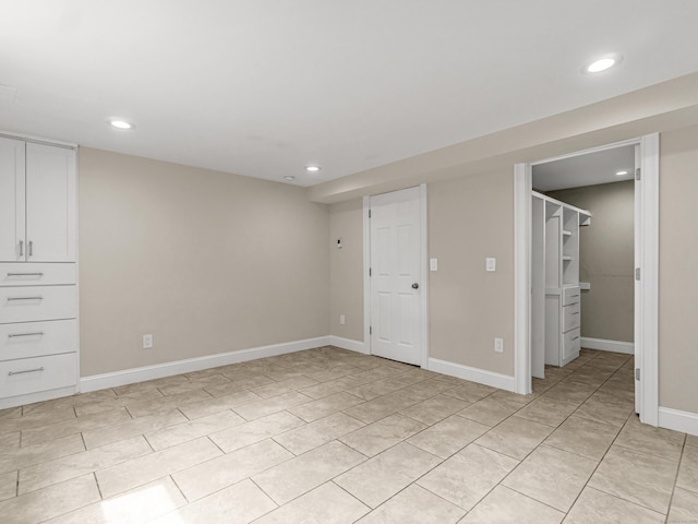 39 Beaver Brook Rd, Danbury, CT 06810 - finished below grade area with recessed lighting and light tile patterned floors