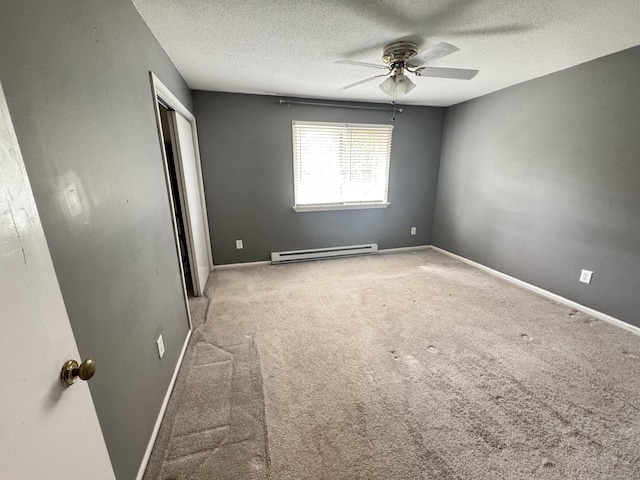 519 Scott Rd, Waterbury, CT 06705 - unfurnished bedroom with baseboard heating, carpet flooring, a textured ceiling, a closet, and a ceiling fan