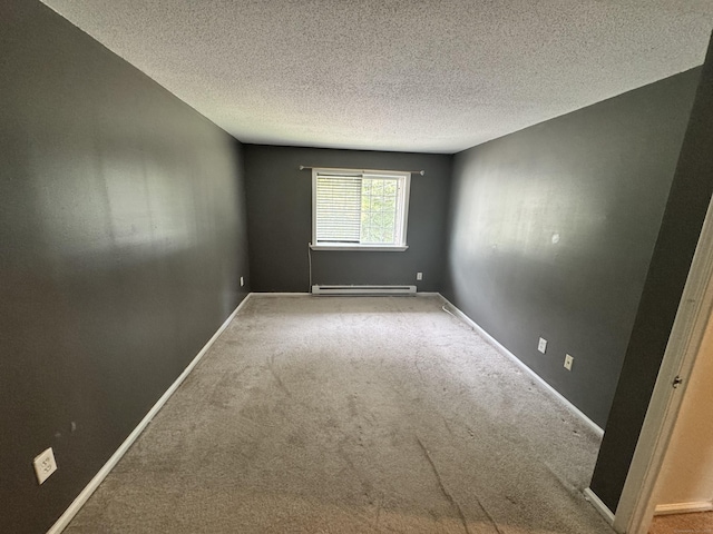 519 Scott Rd, Waterbury, CT 06705 - carpeted empty room featuring baseboard heating and a textured ceiling