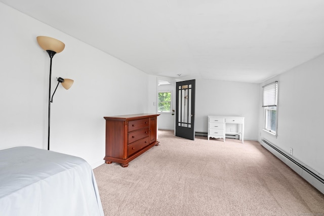 20 Harris St, Enfield, CT 06082 - bedroom with a baseboard heating unit, light colored carpet, and a baseboard radiator