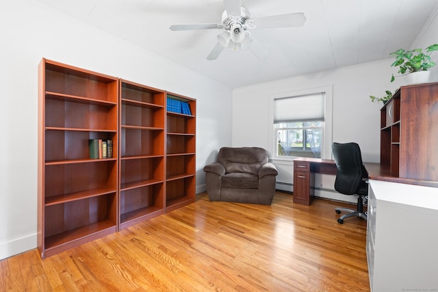 20 Harris St, Enfield, CT 06082 - home office with a baseboard heating unit, light wood-type flooring, crown molding, and ceiling fan