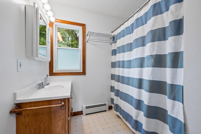 20 Harris St, Enfield, CT 06082 - full bathroom with a baseboard radiator, tile patterned floors, vanity, and a shower with curtain