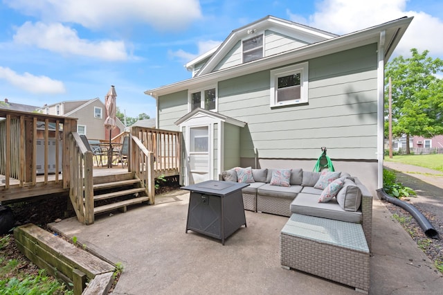 20 Harris St, Enfield, CT 06082 - back of house with a wooden deck, an outdoor living space, and a patio area