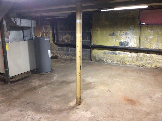 115 Cooper Dr, Waterbury, CT 06704 - unfinished below grade area featuring water heater