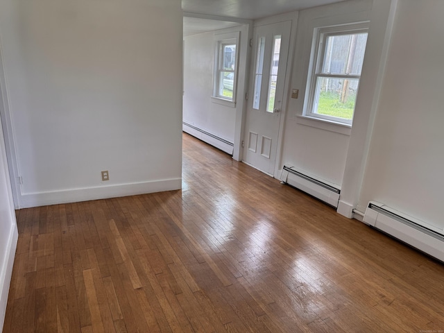 1 Ferry Ln, Portland, CT 06480 - entrance foyer with baseboard heating and hardwood / wood-style floors