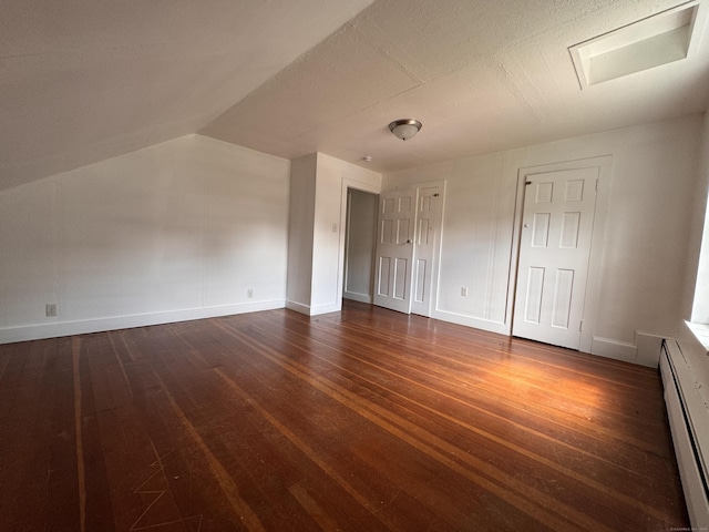 1 Ferry Ln, Portland, CT 06480 - unfurnished bedroom with a baseboard heating unit and dark wood finished floors