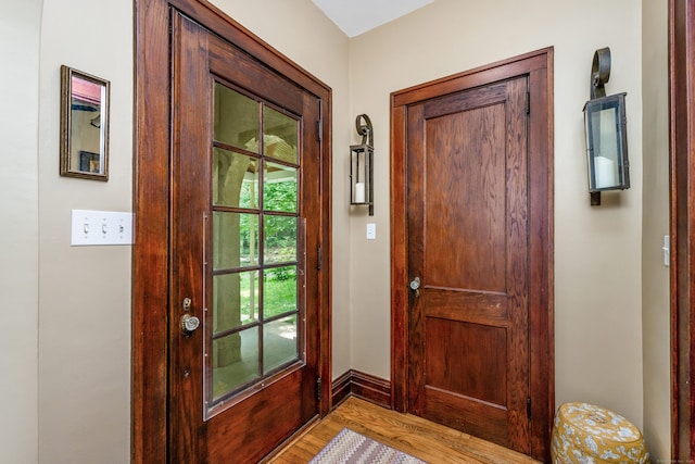 48 Own Home Ave, Wilton, CT 06897 - doorway to outside with light wood-style floors and baseboards