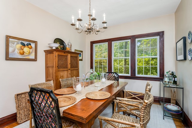 48 Own Home Ave, Wilton, CT 06897 - dining room featuring a chandelier and wood finished floors