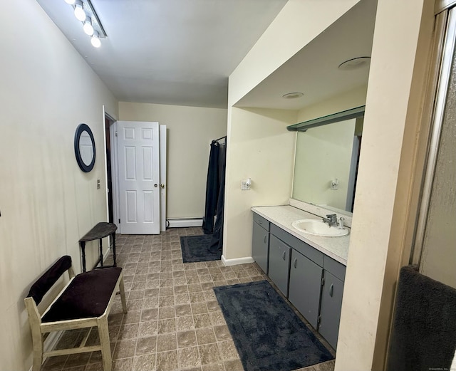 210 Oakville Ave Apt A, Waterbury, CT 06708 - bathroom with a baseboard radiator, vanity, and a shower with shower curtain