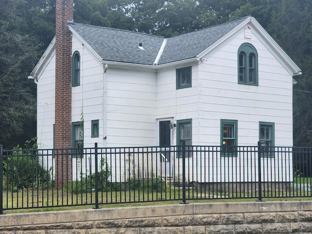130 Westchester Rd, Colchester, CT 06415 - view of front of home featuring a chimney and a shingled roof