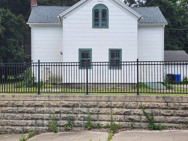 130 Westchester Rd, Colchester, CT 06415 - view of home's exterior featuring a shingled roof and a chimney