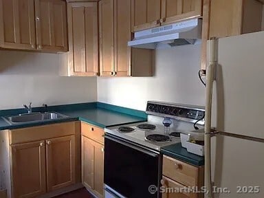 130 Westchester Rd, Colchester, CT 06415 - kitchen with white appliances, under cabinet range hood, and dark countertops