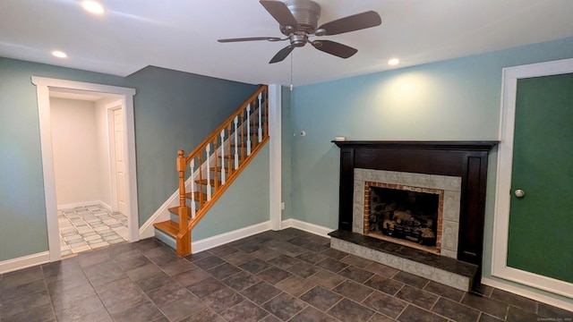 32 Rocky Glen Rd, Danbury, CT 06810 - unfurnished living room featuring a fireplace with raised hearth, recessed lighting, stairway, and ceiling fan