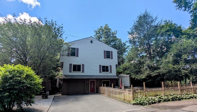 32 Rocky Glen Rd, Danbury, CT 06810 - view of side of property with driveway and a fenced front yard