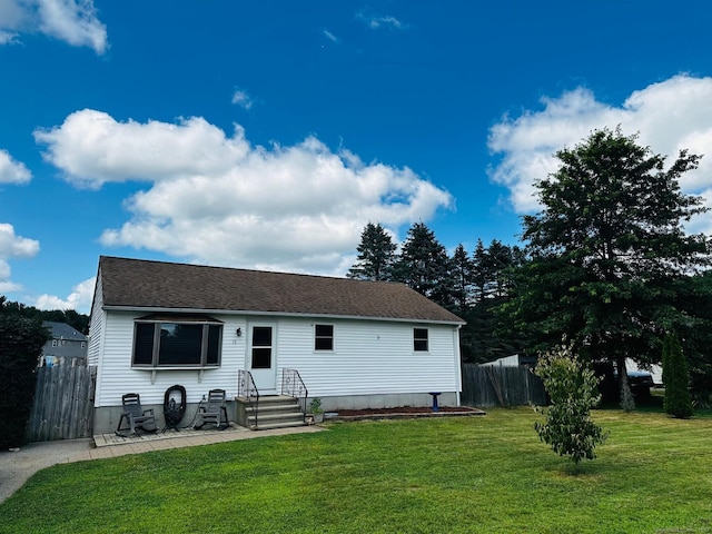 15 Courtney Ln, Killingly, CT 06241 - back of house with roof with shingles