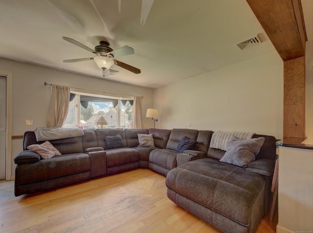 15 Courtney Ln, Killingly, CT 06241 - living area with ceiling fan and light wood finished floors