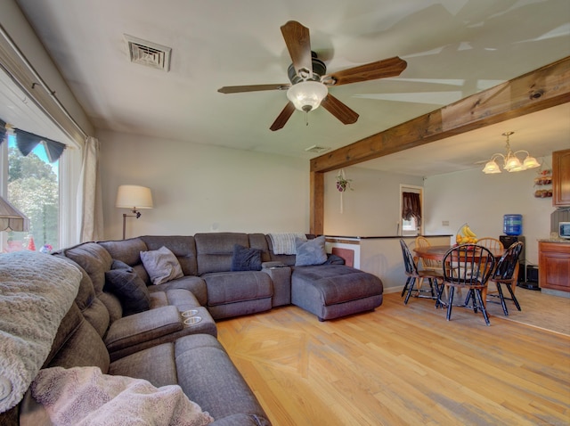 15 Courtney Ln, Killingly, CT 06241 - living area with ceiling fan, a chandelier, and light wood-type flooring