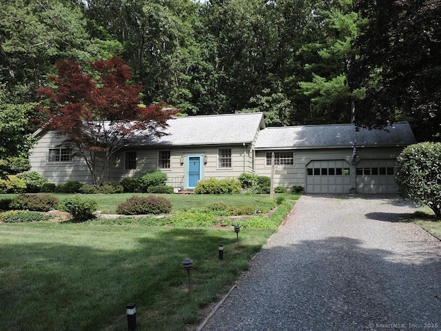 29 Graham Rd, East Windsor, CT 06016 - ranch-style home featuring an attached garage, driveway, and a front lawn