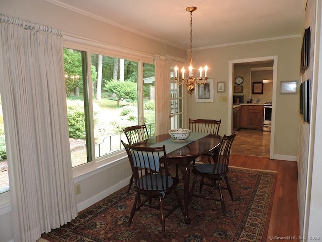 29 Graham Rd, East Windsor, CT 06016 - dining room with a chandelier, ornamental molding, and wood finished floors