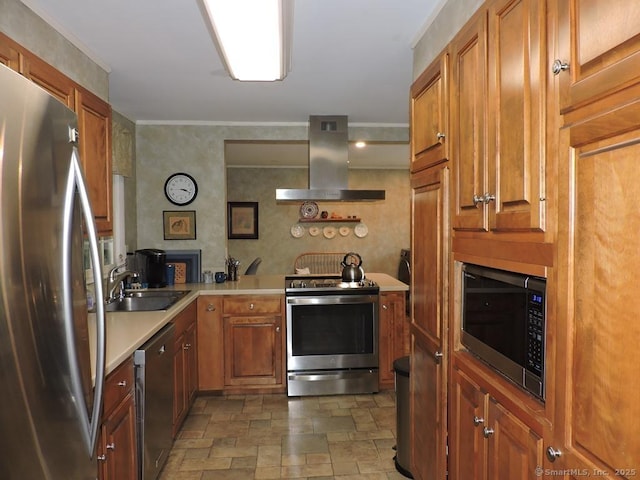 29 Graham Rd, East Windsor, CT 06016 - kitchen with stainless steel appliances, island exhaust hood, stone finish flooring, light countertops, and brown cabinets