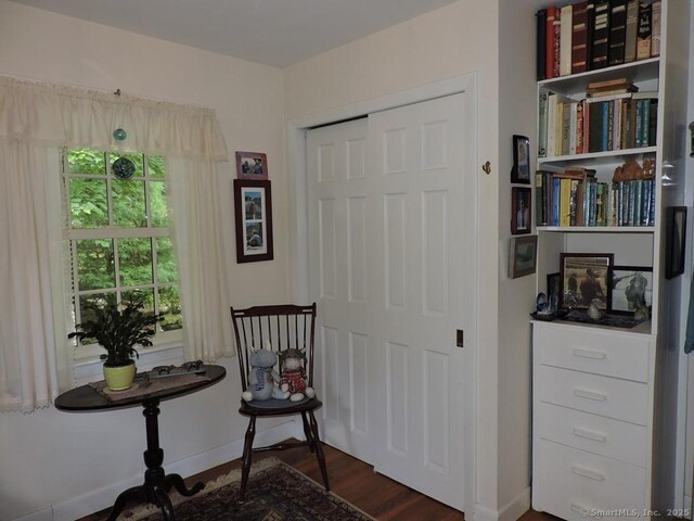 29 Graham Rd, East Windsor, CT 06016 - sitting room featuring dark wood finished floors and baseboards