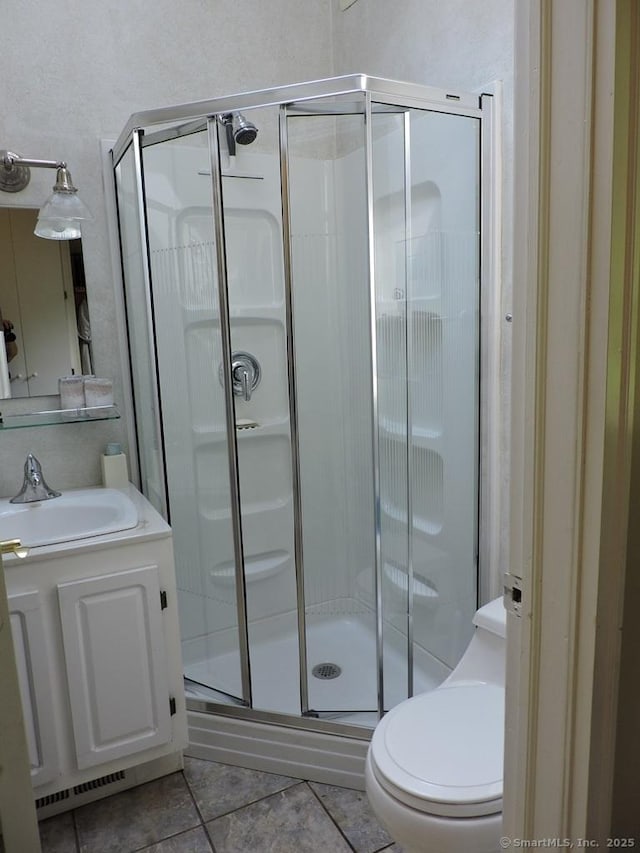 29 Graham Rd, East Windsor, CT 06016 - full bath featuring tile patterned floors, a shower stall, and vanity