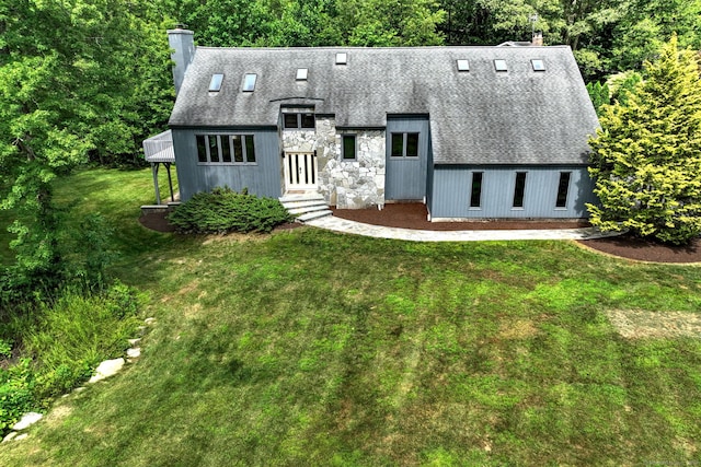 35 Millo Dr, Monroe, CT 06468 - view of front of property featuring a chimney, a front lawn, roof with shingles, and stone siding