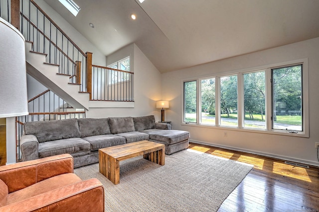 35 Millo Dr, Monroe, CT 06468 - living room featuring plenty of natural light, hardwood / wood-style flooring, recessed lighting, high vaulted ceiling, and a skylight