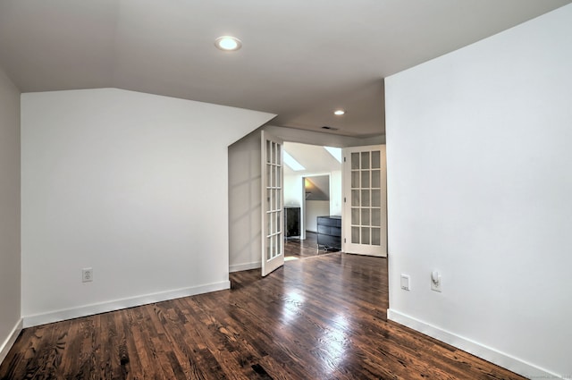 35 Millo Dr, Monroe, CT 06468 - unfurnished room with french doors, recessed lighting, wood finished floors, and lofted ceiling