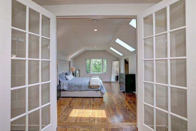 35 Millo Dr, Monroe, CT 06468 - bedroom featuring lofted ceiling, wood finished floors, a skylight, and french doors