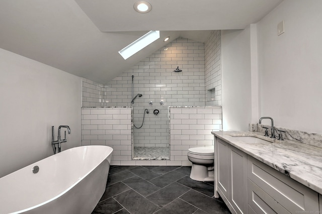 35 Millo Dr, Monroe, CT 06468 - bathroom featuring a skylight, a soaking tub, a tile shower, lofted ceiling, and vanity