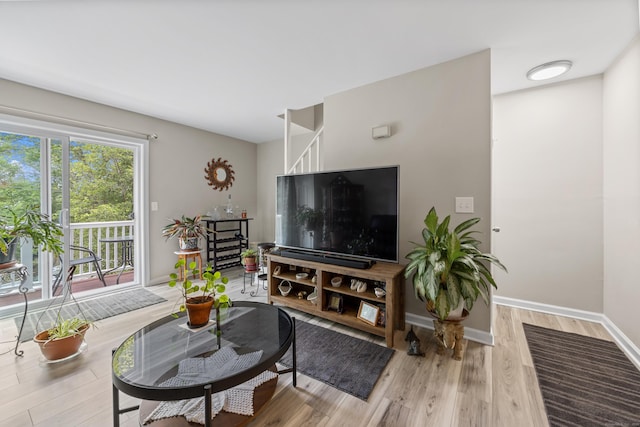 152 Lincoln St Unit 17, Waterbury, CT 06710 - living area featuring light wood finished floors and baseboards
