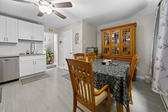 152 Lincoln St Unit 17, Waterbury, CT 06710 - dining area with baseboards and a ceiling fan