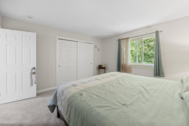 152 Lincoln St Unit 17, Waterbury, CT 06710 - carpeted bedroom featuring a closet and baseboards