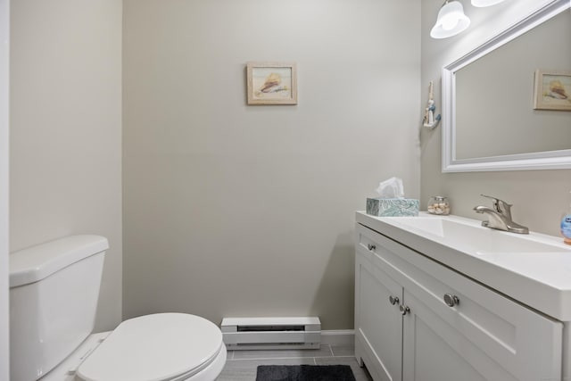 152 Lincoln St Unit 17, Waterbury, CT 06710 - bathroom with a baseboard heating unit, vanity, and tile patterned floors