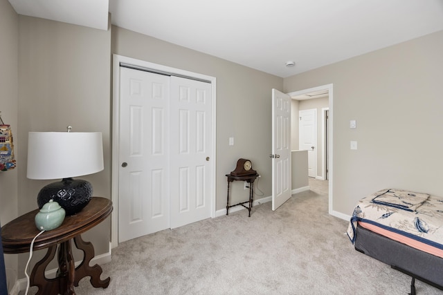 152 Lincoln St Unit 17, Waterbury, CT 06710 - sitting room with light colored carpet and baseboards