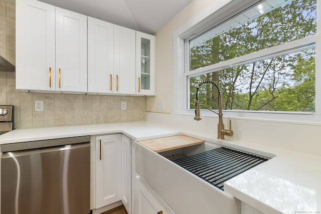145 Lakeview Dr, Colchester, CT 06415 - kitchen with dishwasher, tasteful backsplash, glass insert cabinets, and white cabinets