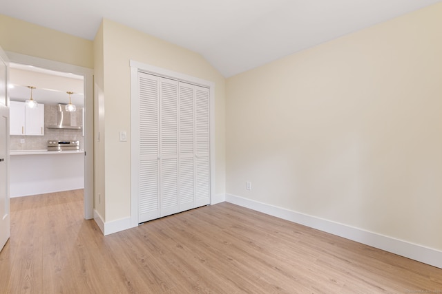 145 Lakeview Dr, Colchester, CT 06415 - unfurnished bedroom with light wood-style floors and a closet